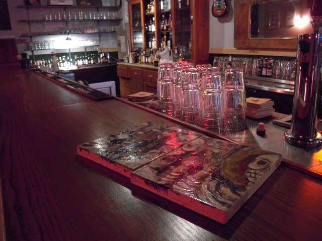 Art on the bar at Cole's in Logan Square
